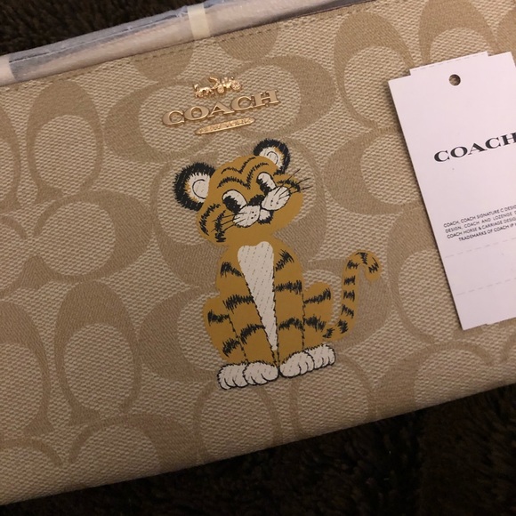 Coach Handbags - SALE!! NWT Coach RARE Tiger Print Wristlet!!